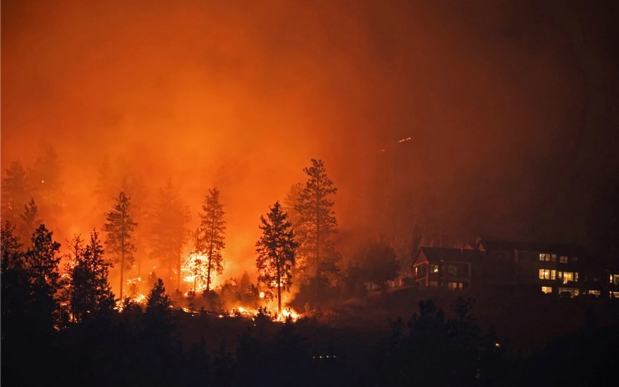 Tens of Thousands Evacuate as Western Canada Wildfires Rage